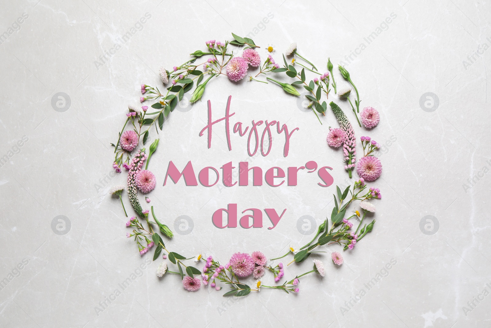 Image of Happy Mother's Day. Greeting card with frame of pink flowers on light background, top view