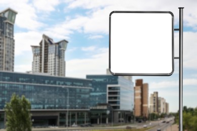 Image of Blank advertising board near road in city. Space for text