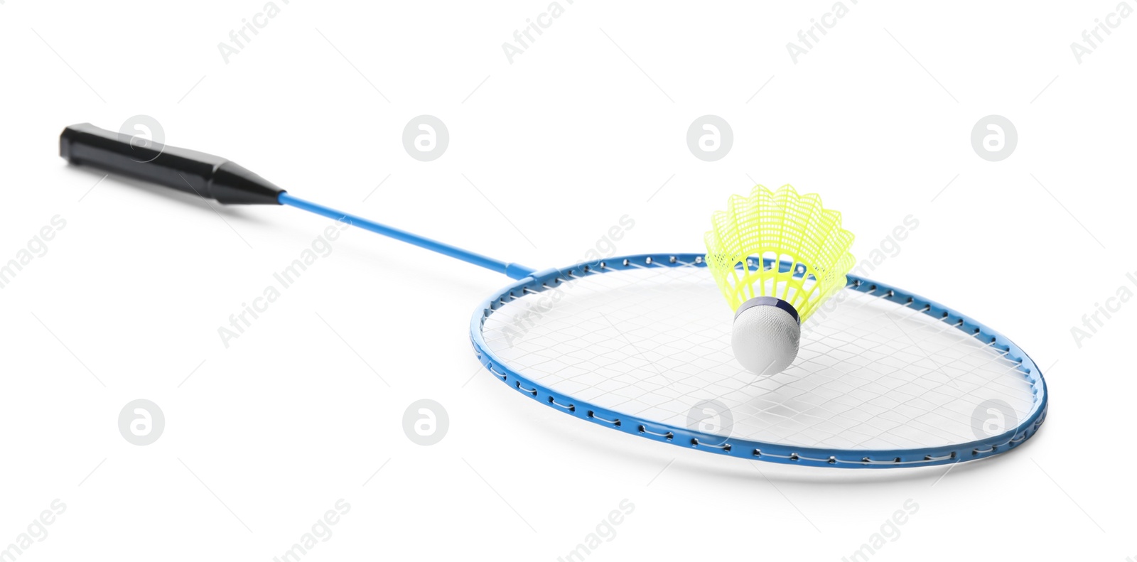 Photo of Badminton racket and shuttlecock on white background