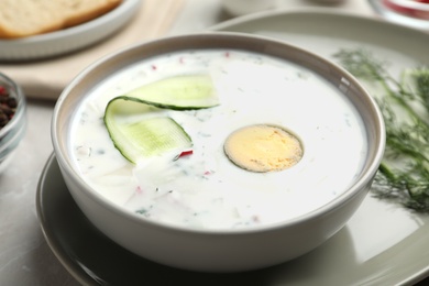 Photo of Delicious cold summer soup in bowl, closeup