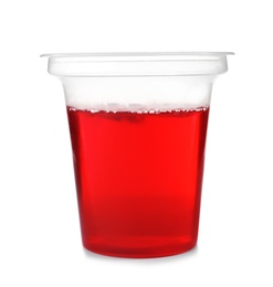 Tasty jelly dessert in plastic cup on white background