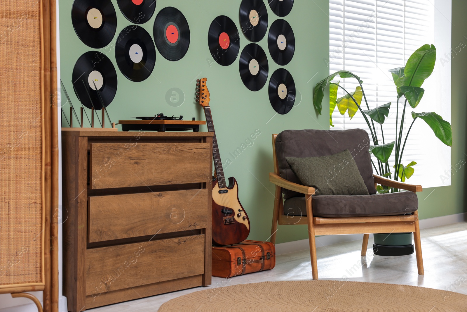 Photo of Living room interior decorated with vinyl records