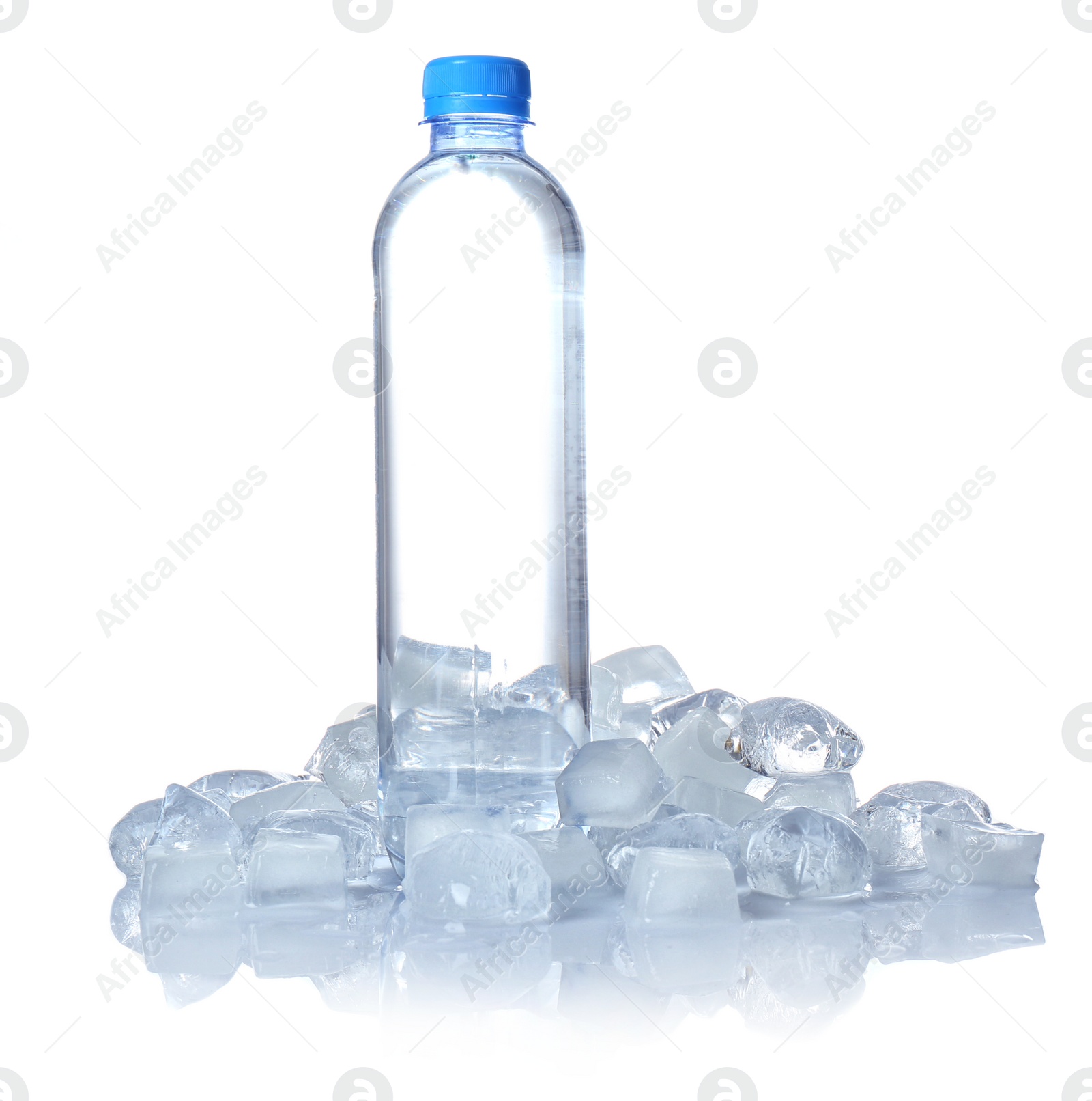 Photo of Bottle of water and ice cubes on white background