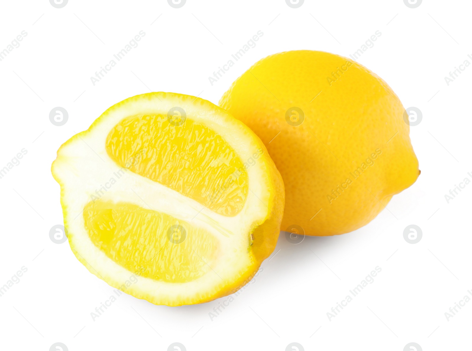 Photo of Cut and whole ripe lemons isolated on white