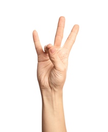 Photo of Woman showing number seven on white background, closeup. Sign language