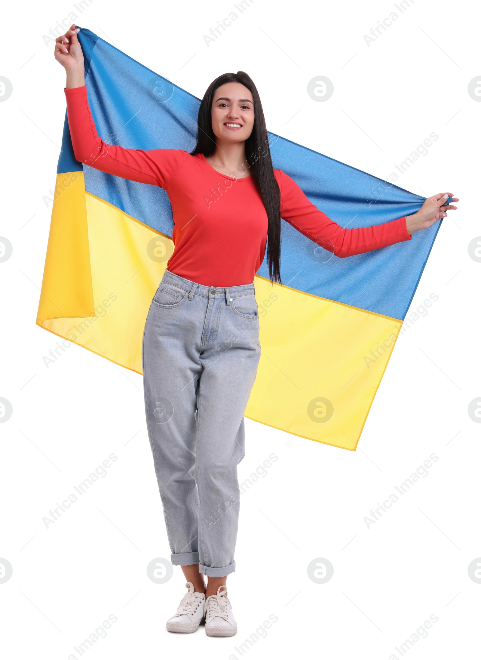 Photo of Young woman with flag of Ukraine on white background