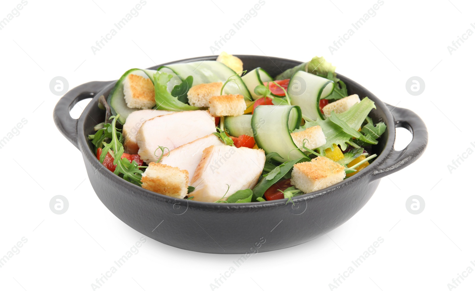 Photo of Delicious salad with croutons, chicken and vegetables isolated on white