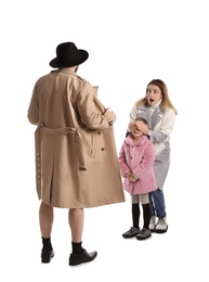 Photo of Exhibitionist exposing naked body under coat in frontmother with child isolated on white