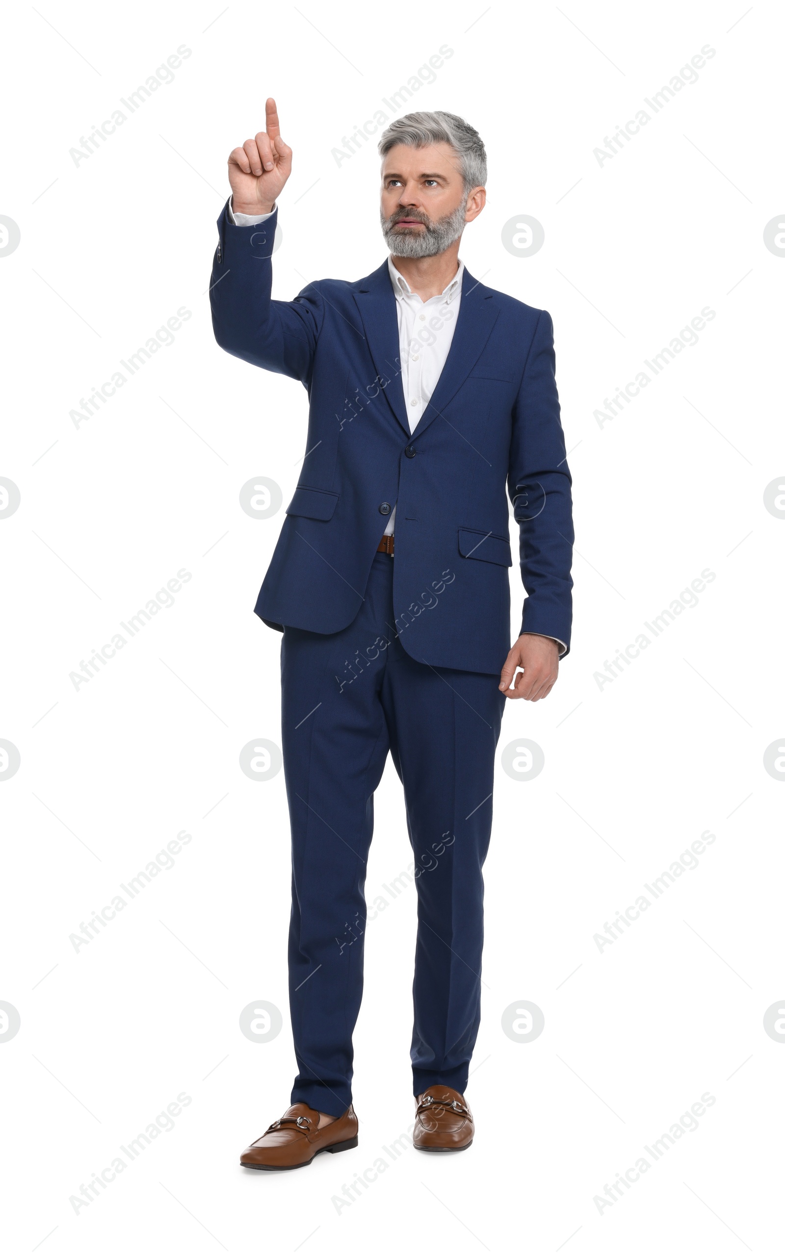 Photo of Mature businessman in stylish clothes posing on white background