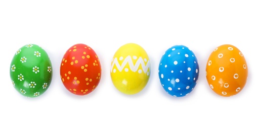 Photo of Decorated Easter eggs on white background, top view. Festive tradition