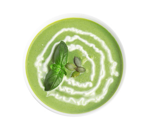 Delicious broccoli cream soup isolated on white, top view