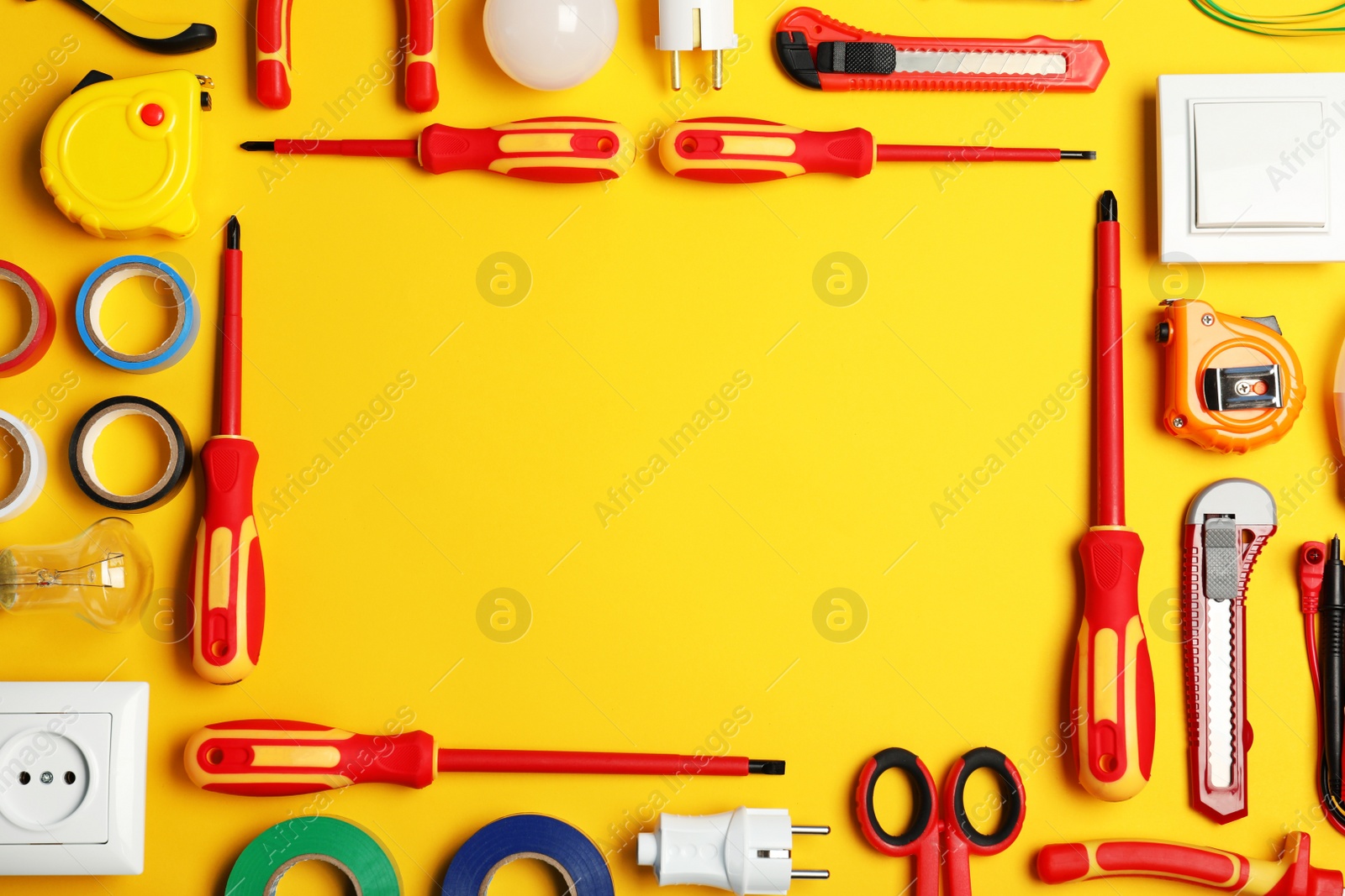 Photo of Flat lay composition with electrician's tools and space for text on color background