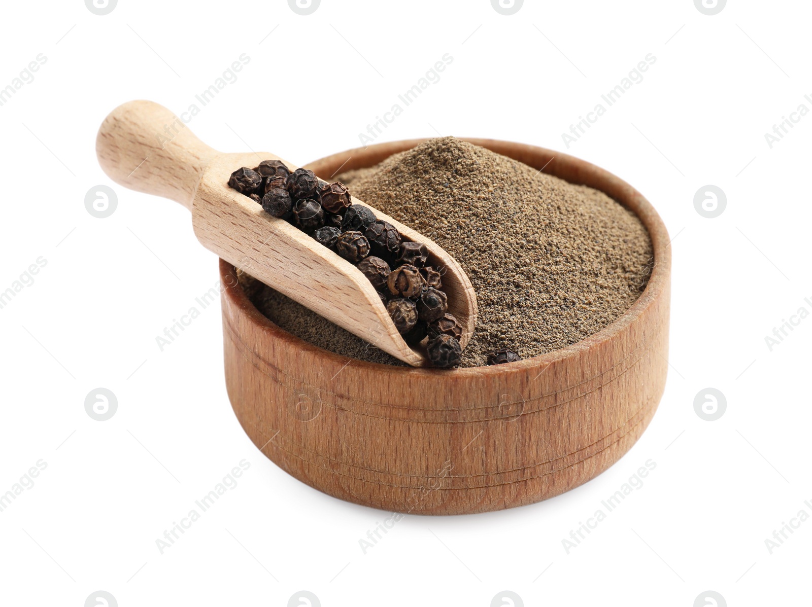 Photo of Aromatic spice. Ground and whole black pepper isolated on white