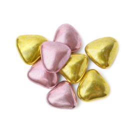 Photo of Many delicious heart shaped candies on white background, top view