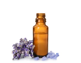 Photo of Bottle with aromatic lavender oil on white background