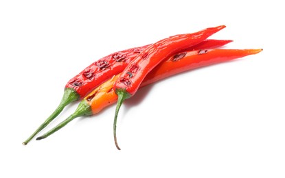 Photo of Tasty grilled chili peppers isolated on white