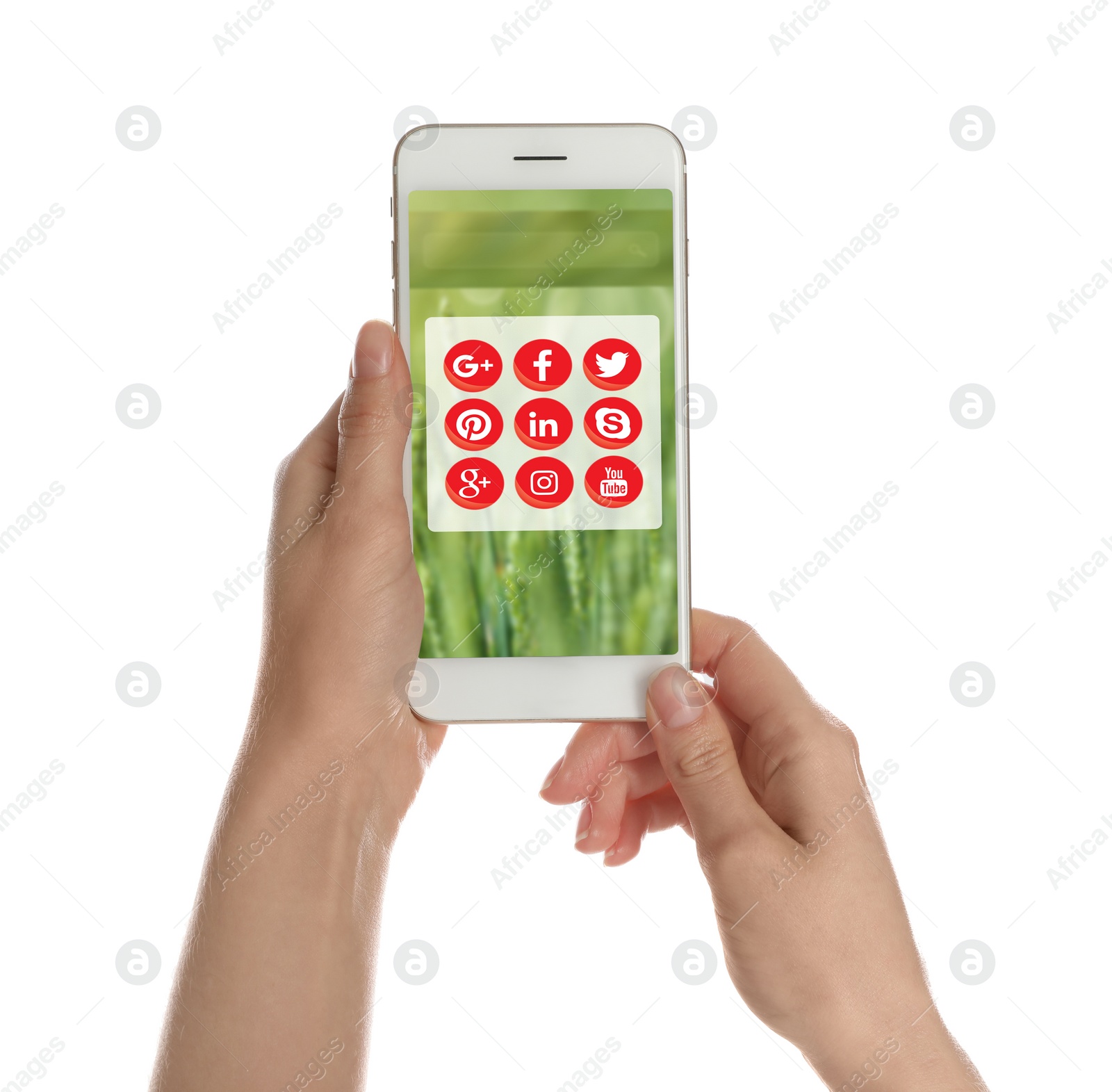 Image of MYKOLAIV, UKRAINE - APRIL 30, 2020: Woman holding phone with social media apps icons on white background, closeup