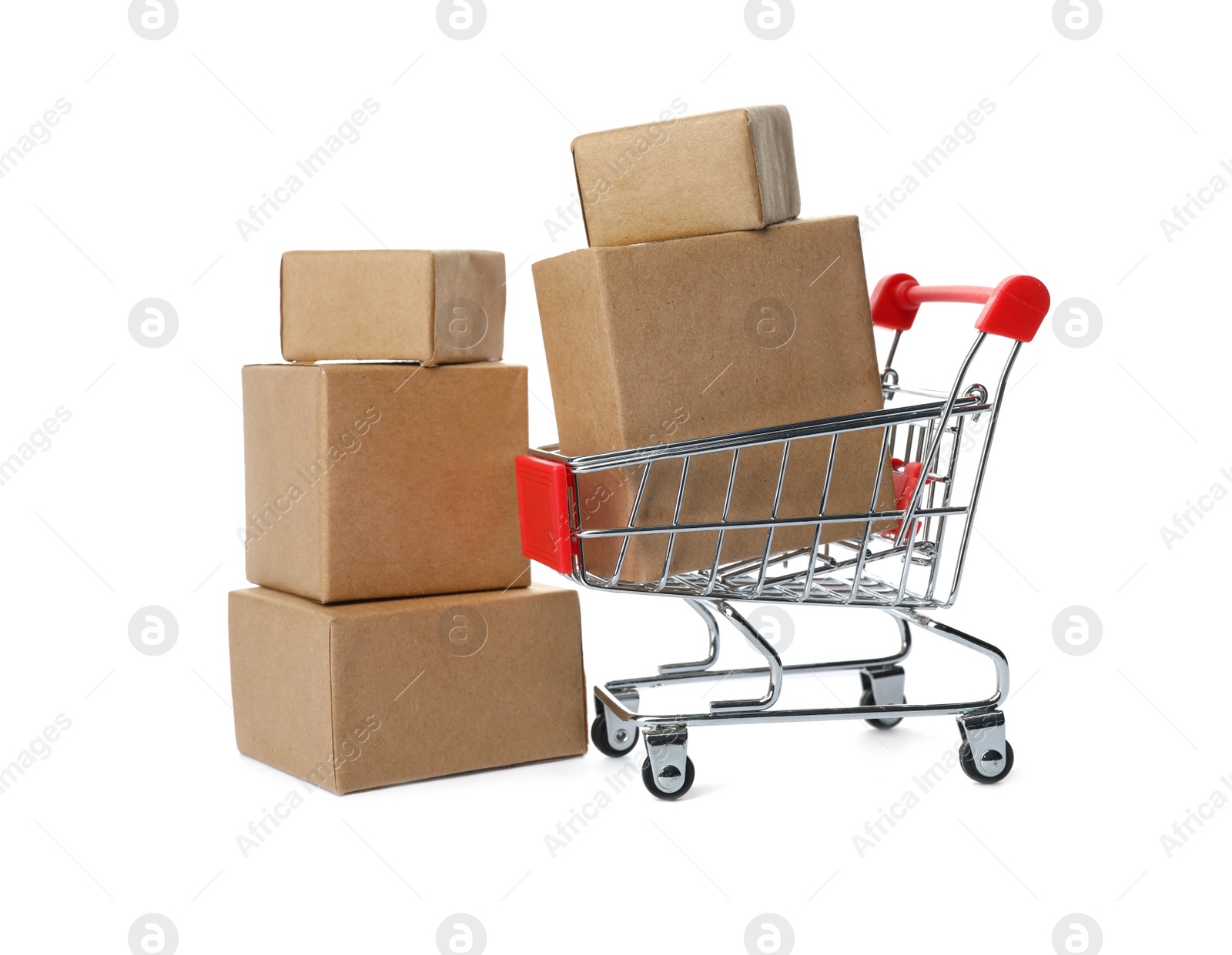 Photo of Shopping cart and boxes isolated on white. Logistics and wholesale concept