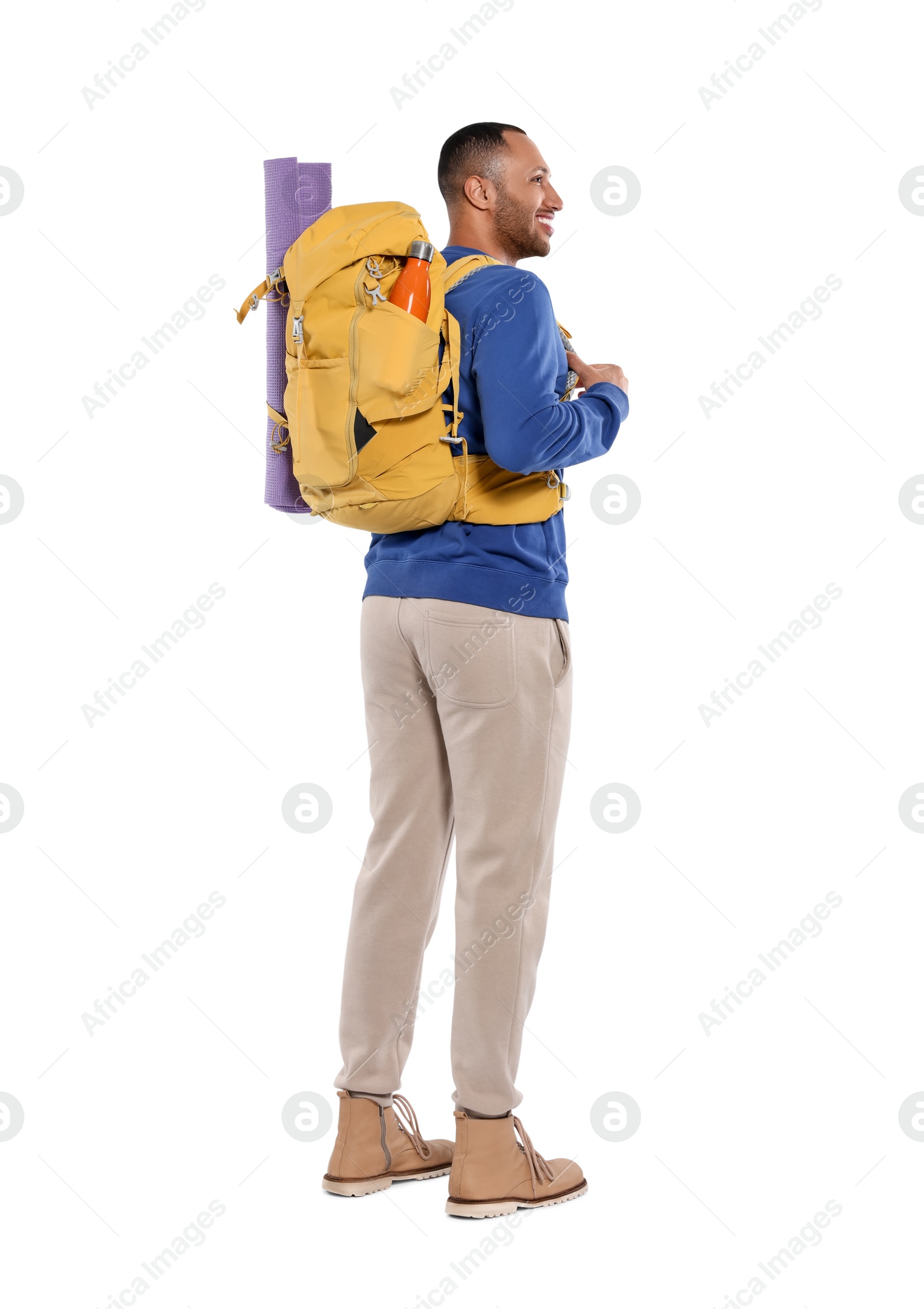 Photo of Happy tourist with backpack on white background