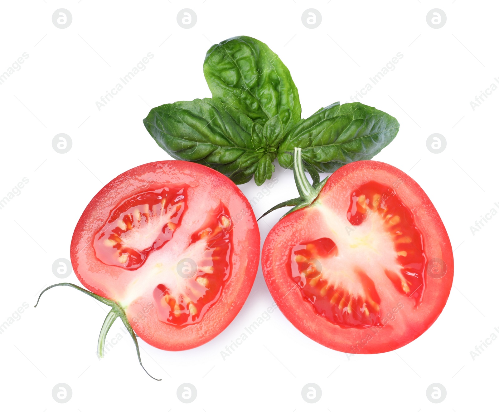 Photo of Fresh green basil leaves and cut tomato on white background, top view