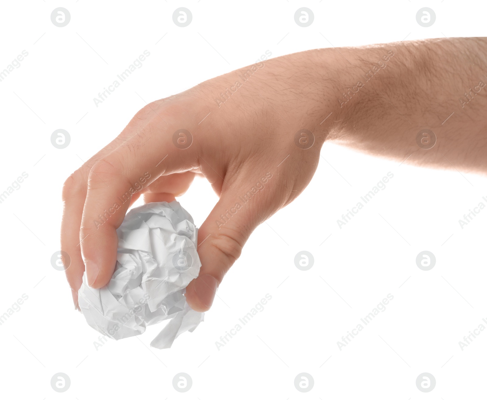 Photo of Man crumpling paper against white background, closeup. Generating idea