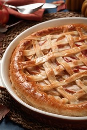 Photo of Delicious homemade apple pie on table, closeup