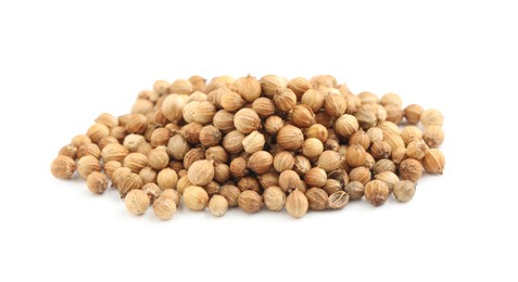 Heap of dried coriander seeds on white background
