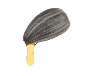 Image of Sunflower seed in husk with oil on white background