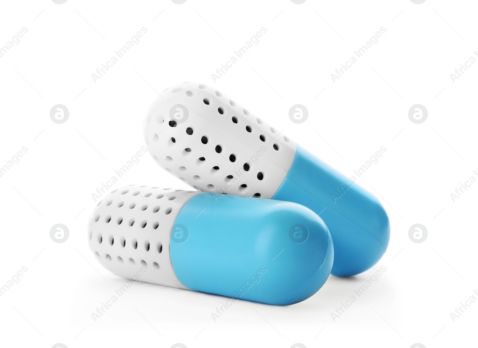 Photo of Capsule shoe fresheners on white background