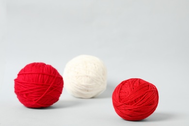 Soft colorful woolen yarns on white background