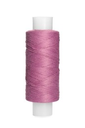 Spool of lilac sewing thread isolated on white