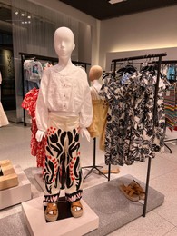 WARSAW, POLAND - JULY 17, 2022: Fashion store display with kids clothes in shopping mall