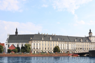 Picturesque view of beautiful buildings near river