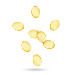 Image of Vitamin. Softgel capsules falling on white background