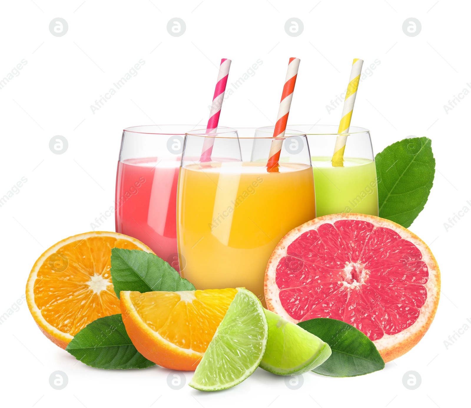 Image of Glasses of different citrus juice, fresh fruits and green leaves on white background