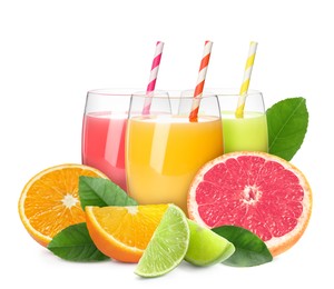 Image of Glasses of different citrus juice, fresh fruits and green leaves on white background