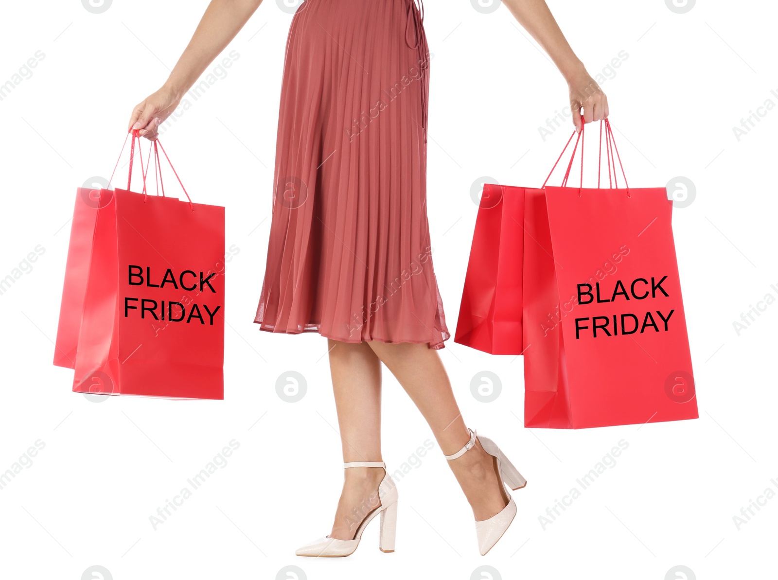 Photo of Woman with shopping bags on white background, closeup. Black Friday Sale