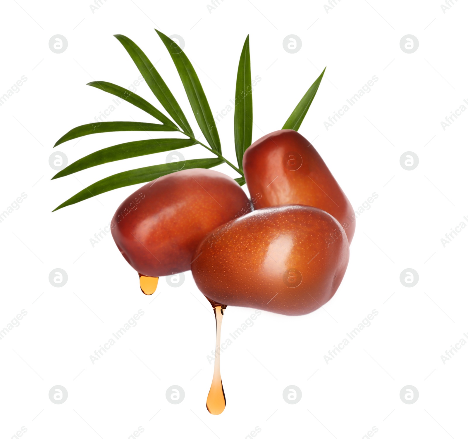 Image of Oil dripping from palm fruits on white background