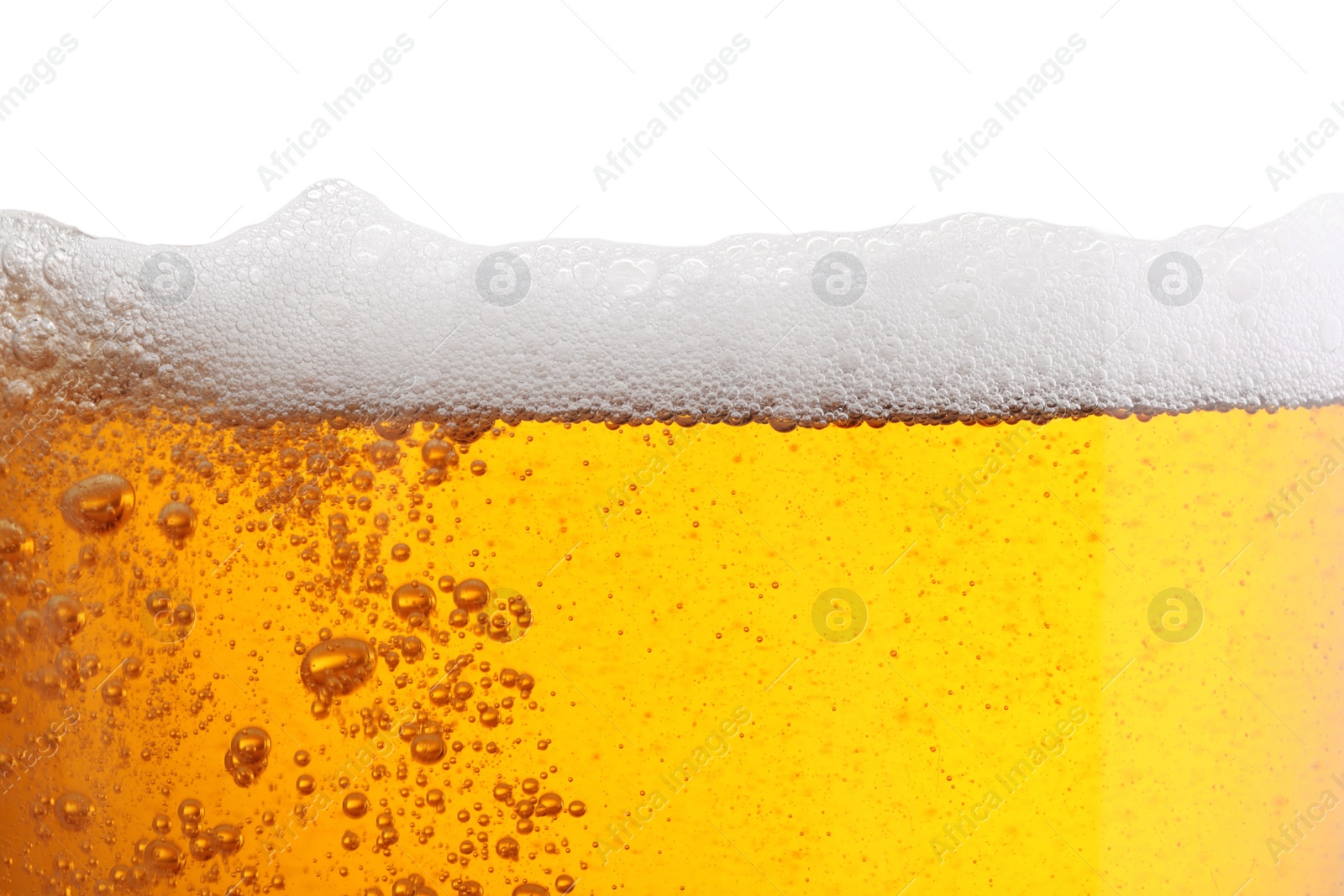 Photo of Tasty beer with foam in glass, closeup