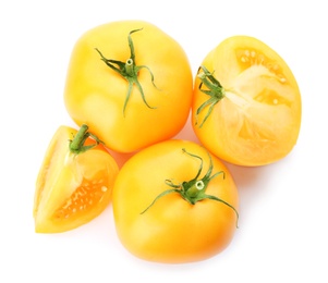 Photo of Cut ripe yellow tomatoes isolated on white, top view