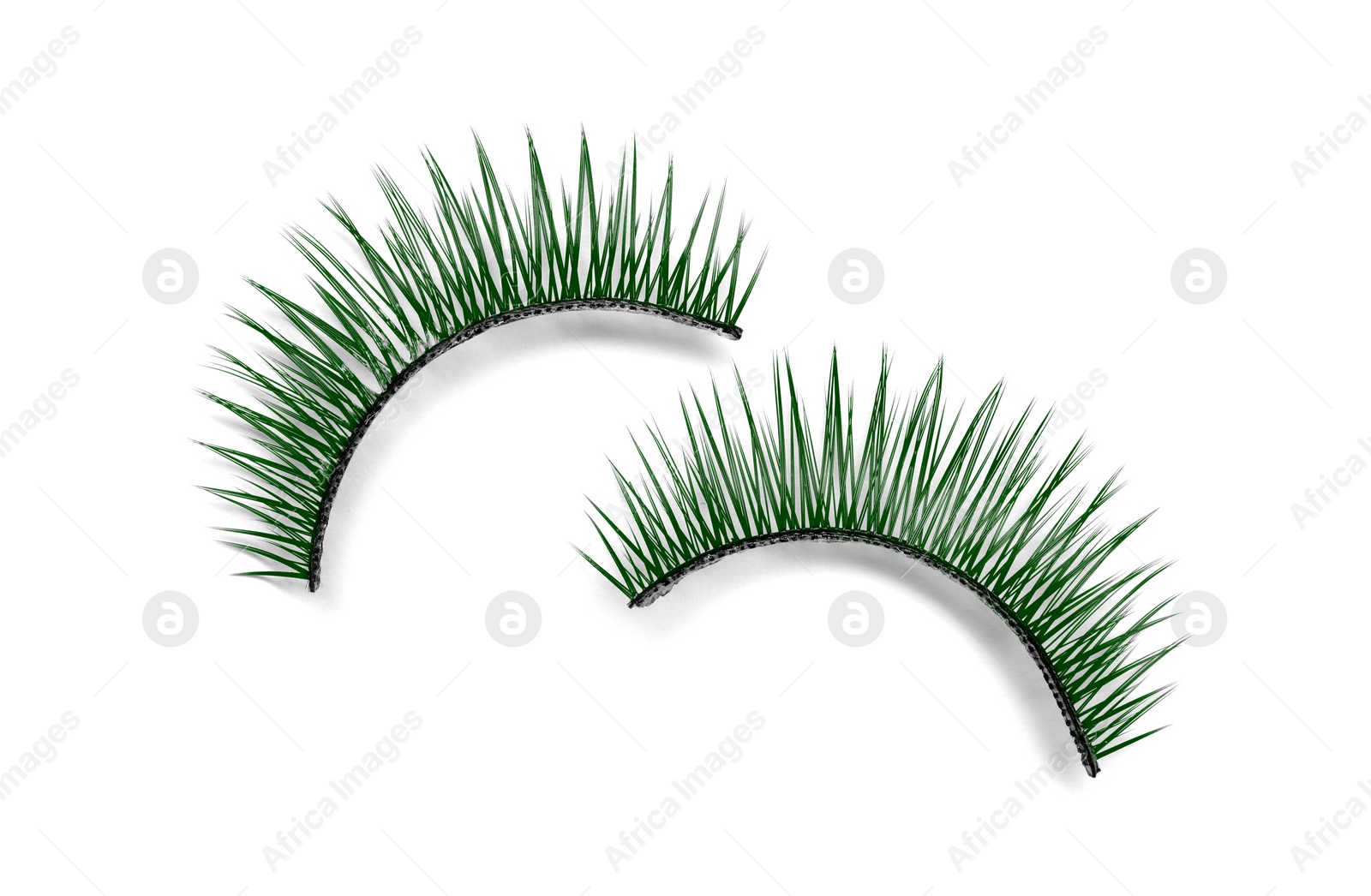 Image of Beautiful pair of green false eyelashes on white background, top view