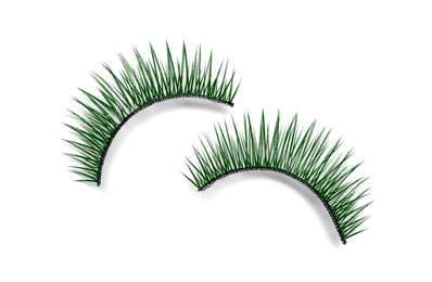 Beautiful pair of green false eyelashes on white background, top view