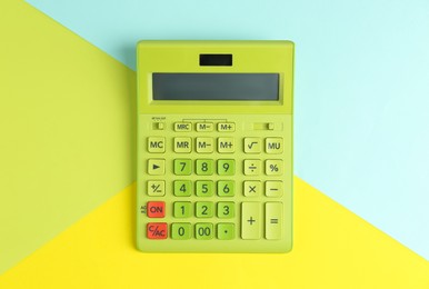 Photo of Modern calculator on color background, top view