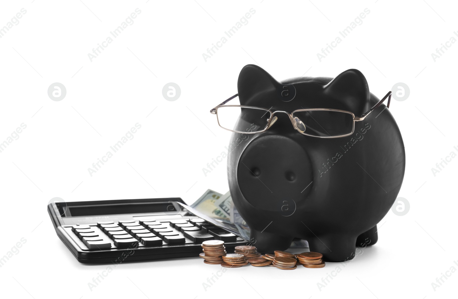 Photo of Piggy bank, calculator and cash isolated on white. Money savings