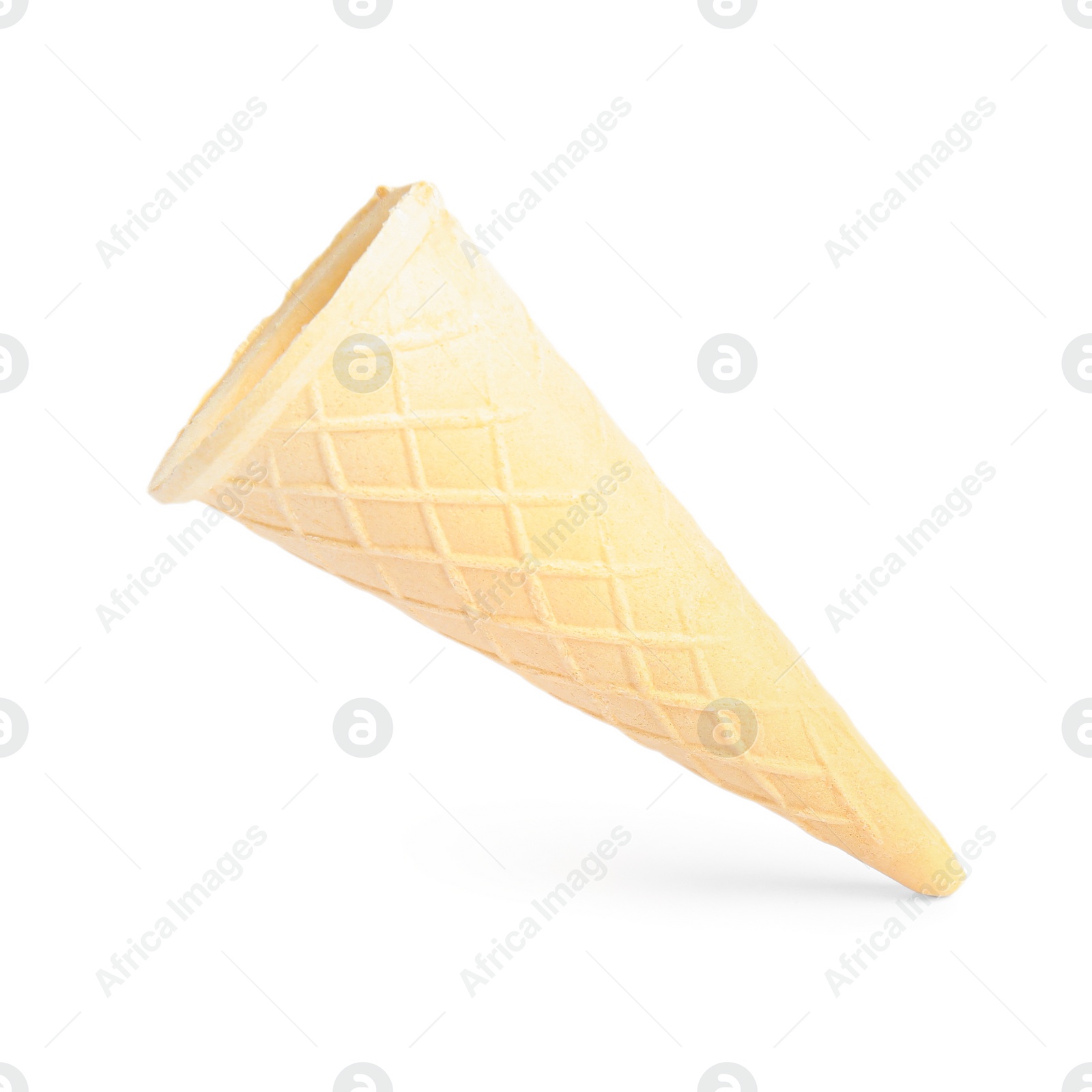 Photo of Empty wafer ice cream cone on white background