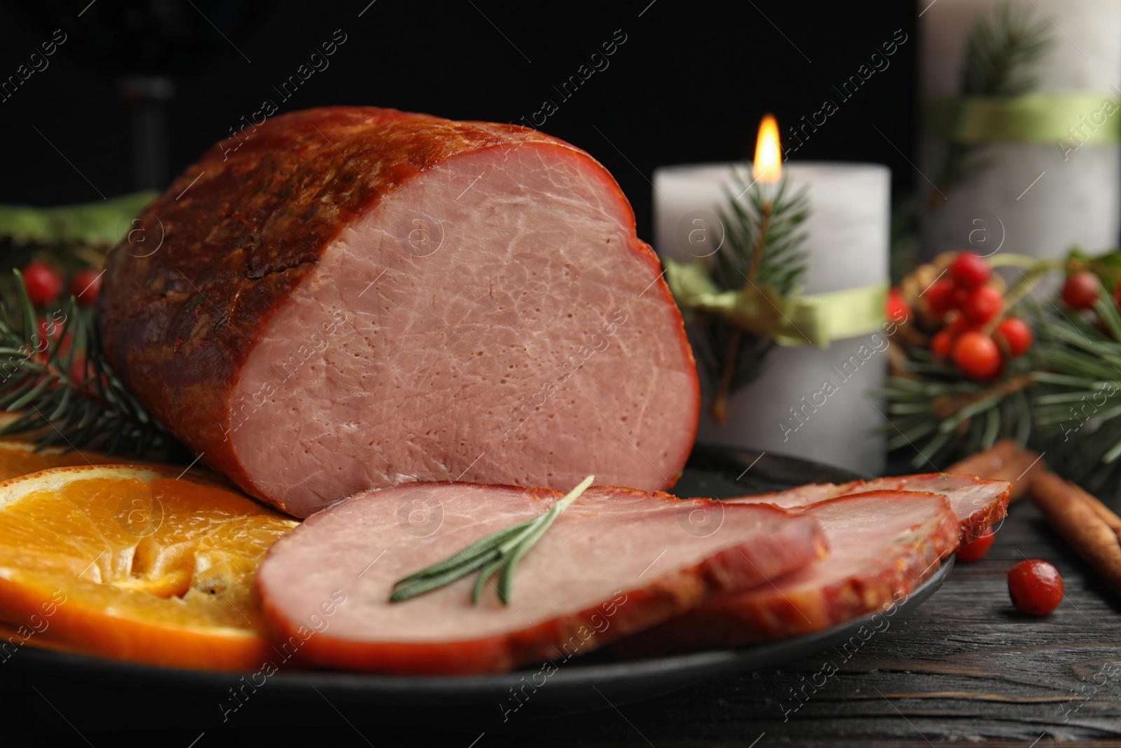 Photo of Delicious ham served on table, closeup. Christmas dinner