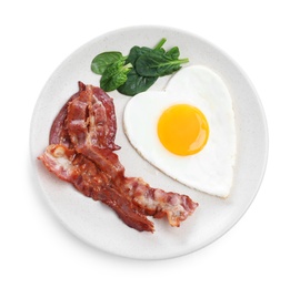 Photo of Romantic breakfast with fried bacon and heart shaped egg isolated on white, top view. Valentine's day celebration