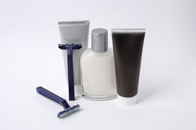 Photo of Different men's shaving accessories on white background