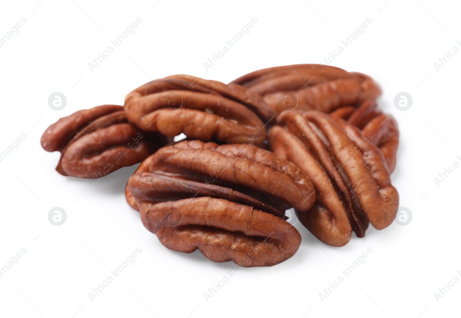 Photo of Many tasty pecan nuts isolated on white