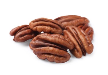 Photo of Many tasty pecan nuts isolated on white